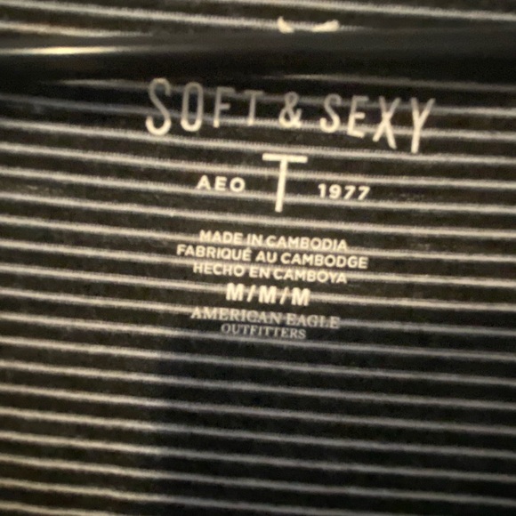 Black and white striped crop top (longer crop top). Size medium. - Picture 2 of 3